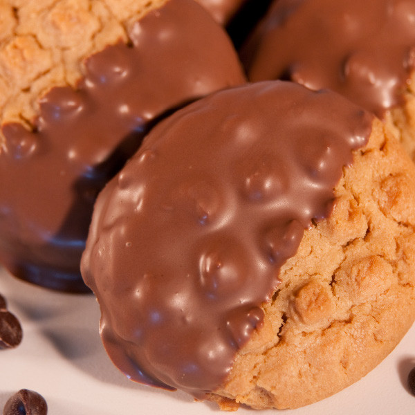 One of our most popular cookie flavors - a soft, rich and solid peanut butter cookie. If that wasn't good enough already, just dip that delicious cookie in smooth milk chocolate. What a great pair!

Each cookie is approximately 3 in diameter.