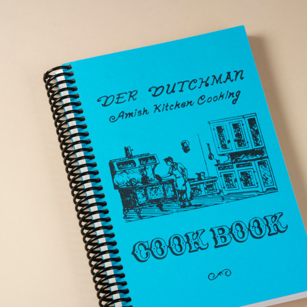 The cooks of the famed Der Dutchman Restaurant in Walnut Creek, Ohio, know exactly how to put the comfort in comfort food. First published in 1973, this classic cookbook contains fun surprises like "Never-fail Pie Crust", "Bushel Cookies", "Poor Man's Steak", and "Old-fashioned Butterscotch Pie." Along with traditional recipes destined to become dog-eared favorites, you'll find original Pennsylvania Dutch jingles in every chapter.

180 pages. A great stuffer for your Amish Gift Baskets!
