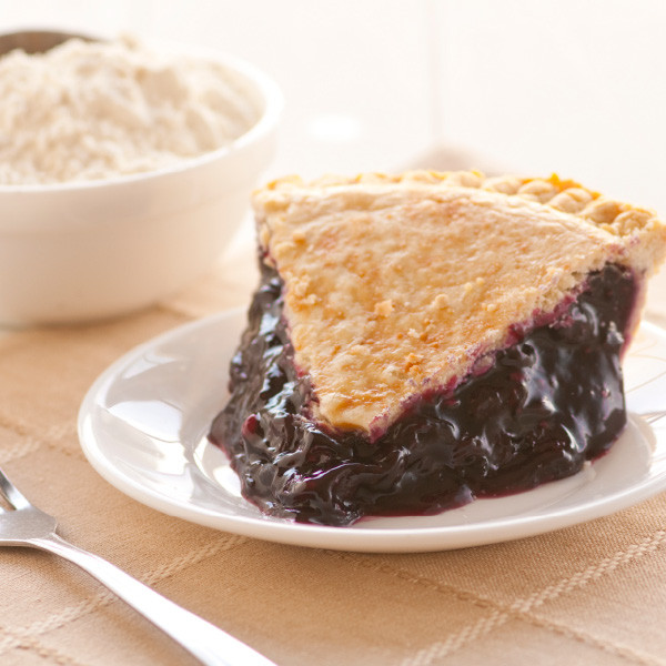 Our Classic Blueberry Pie is filled with plump, ripe blueberries in a thick flavorful filling then baked in our homemade pie crusts. No artificial flavorings and colorings are used. Our double-crusted fruit pies are lightly brushed with butter and sprinkled with sugar to brown the crust.

Pies will arrive pre-baked and frozen in an insulated shipping cooler. Simply thaw in the oven and your home will be filled with the sweet scent of our Amish bakery. Instructions are included. 9 inch pie. Homemade Amish Pie made in Ohio's Amish Country.