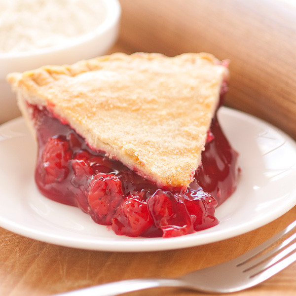 Just the right blend of sweet and tangy, our cherry pie is made with tart, ripe sour cherries. No artificial flavorings and colorings are used. Our double-crusted fruit pies are lightly brushed with butter and sprinkled with sugar to brown the crust. Pies will arrive pre-baked and frozen in an insulated shipping cooler. Simply thaw in the oven and your home will be filled with the sweet scent of our Amish bakery. Instructions are included. Baked and shipped from Ohio's Amish County. 

We do not use high-fructose corn syrup to make our fruit pie fillings. 

Available as a 9 inch pie.