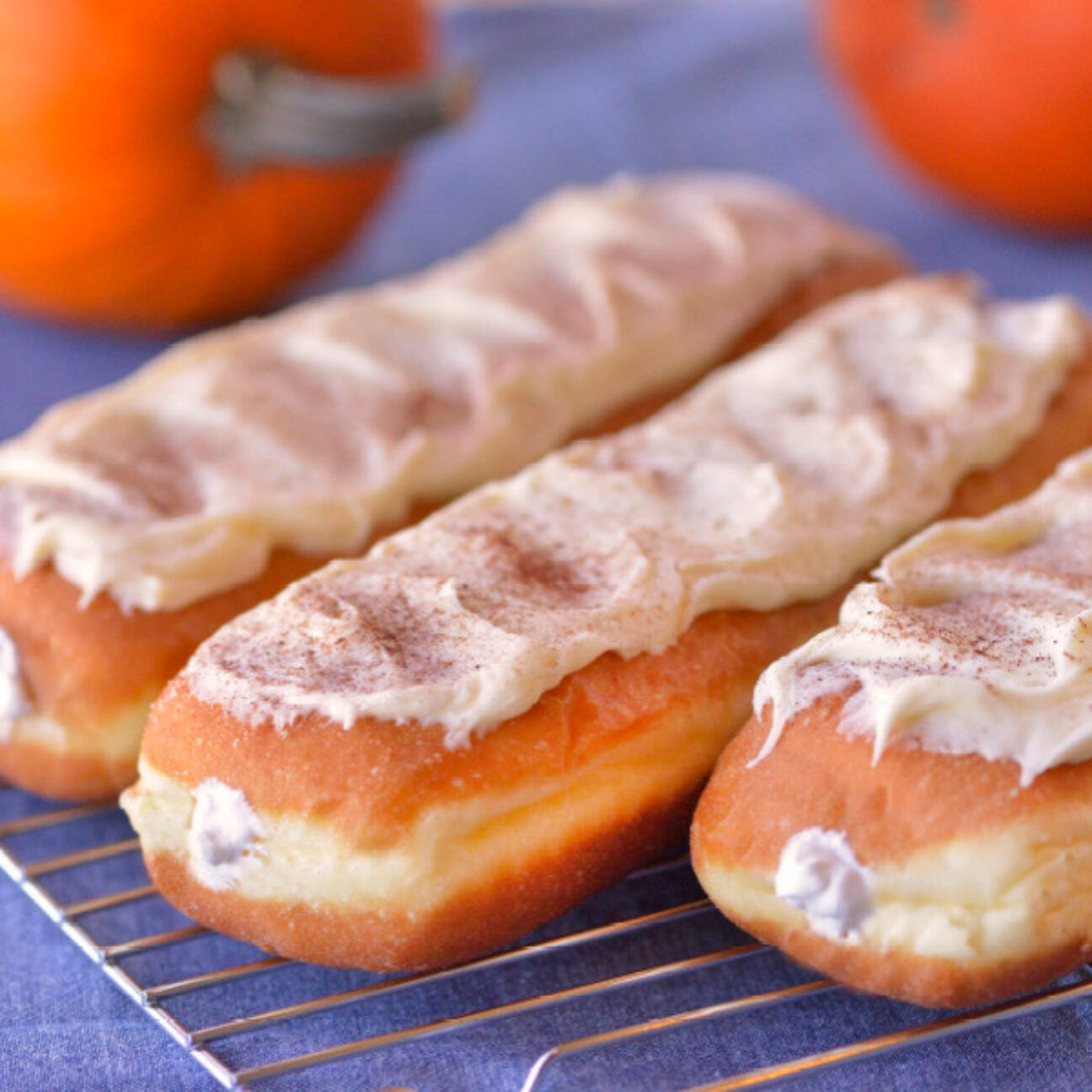 Special for the Fall season, enjoy the unique treat of our Pumpkin Long Johns!

One of the most popular items in our bakeries, our Amish creamsticks (also known as eclairs or long johns) are a rich decadent treat. At approximately seven inches long, our homemade creamsticks will dwarf most commercial bakeries' pastries. Our Pumpkin creamsticks (and all our bakery pastries) are fried in trans-fat free soybean oil then filled liberally with a mild fluffy pumpkin cream. Frosted with Pumpkin-flavored icing. Baked and shipped from Ohio's Amish Country.

Comes as a half-dozen creamsticks and will ship un-iced for easier transit. Frosting will come packaged separately.