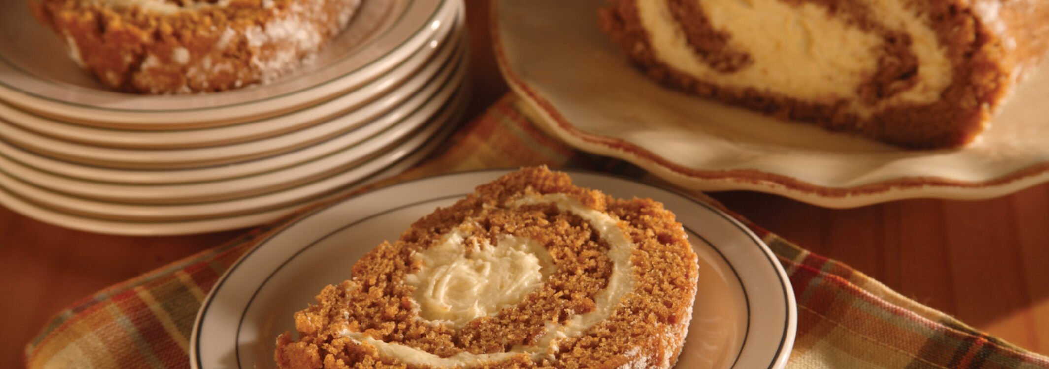 slices of pumpkin roll on plates