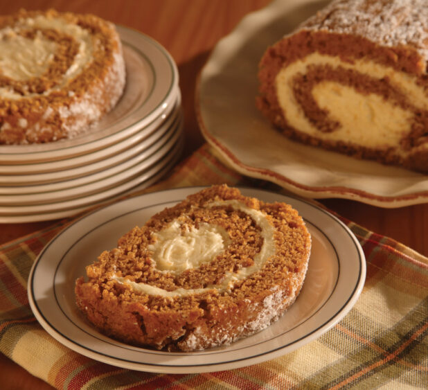 slices of pumpkin roll on plates